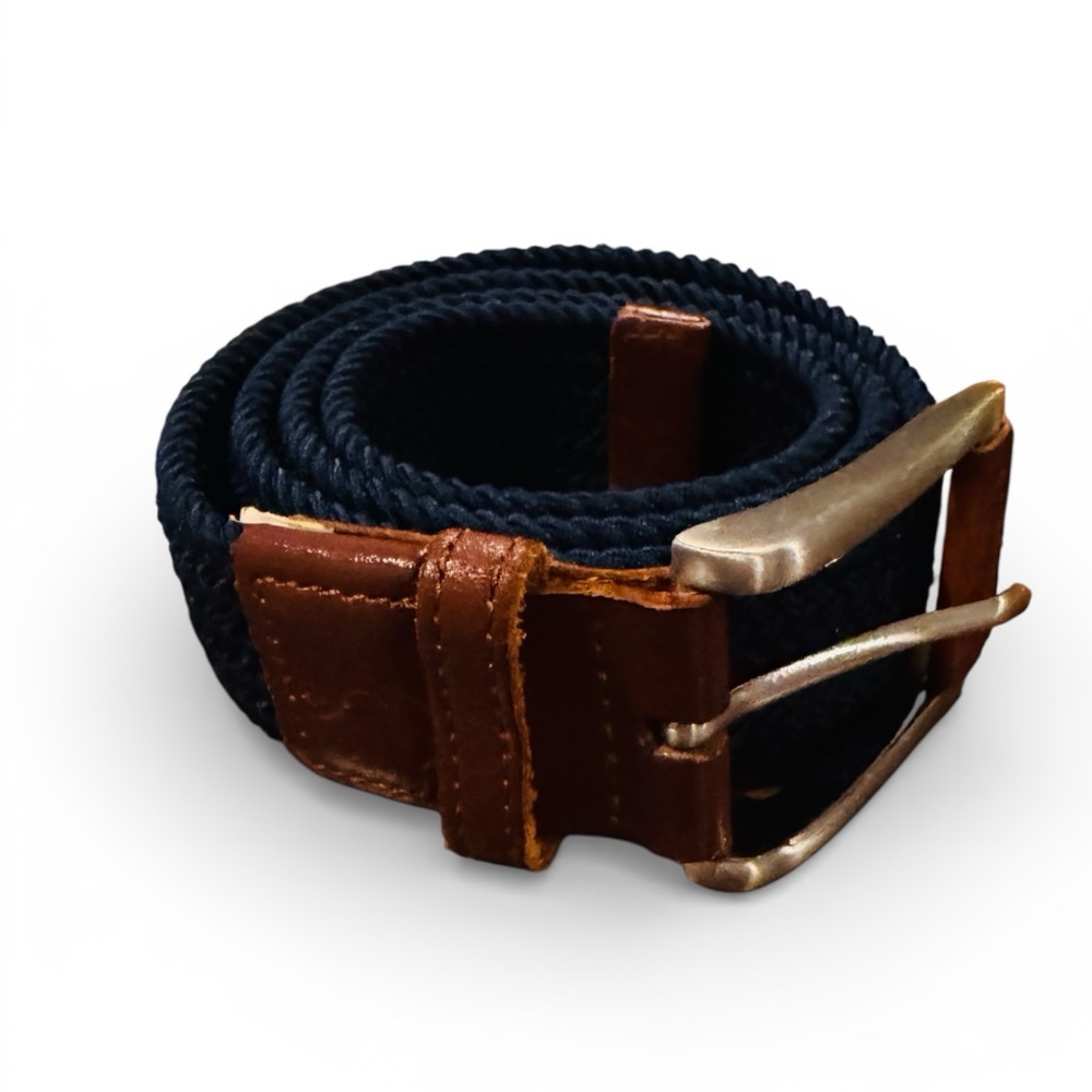 Puma golf stretch belt, navy blue with brown trim, size medium, fits a 34” well